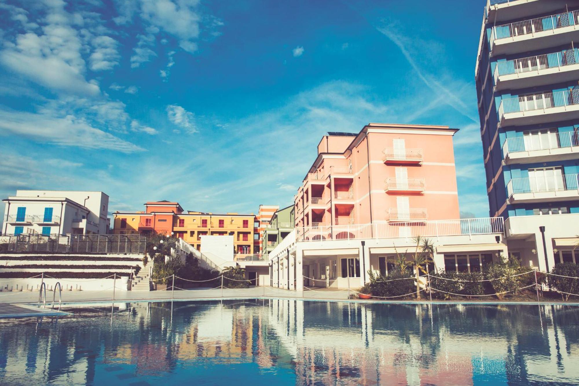 Ai Pozzi Village Resort & Spa Лоано Экстерьер фото